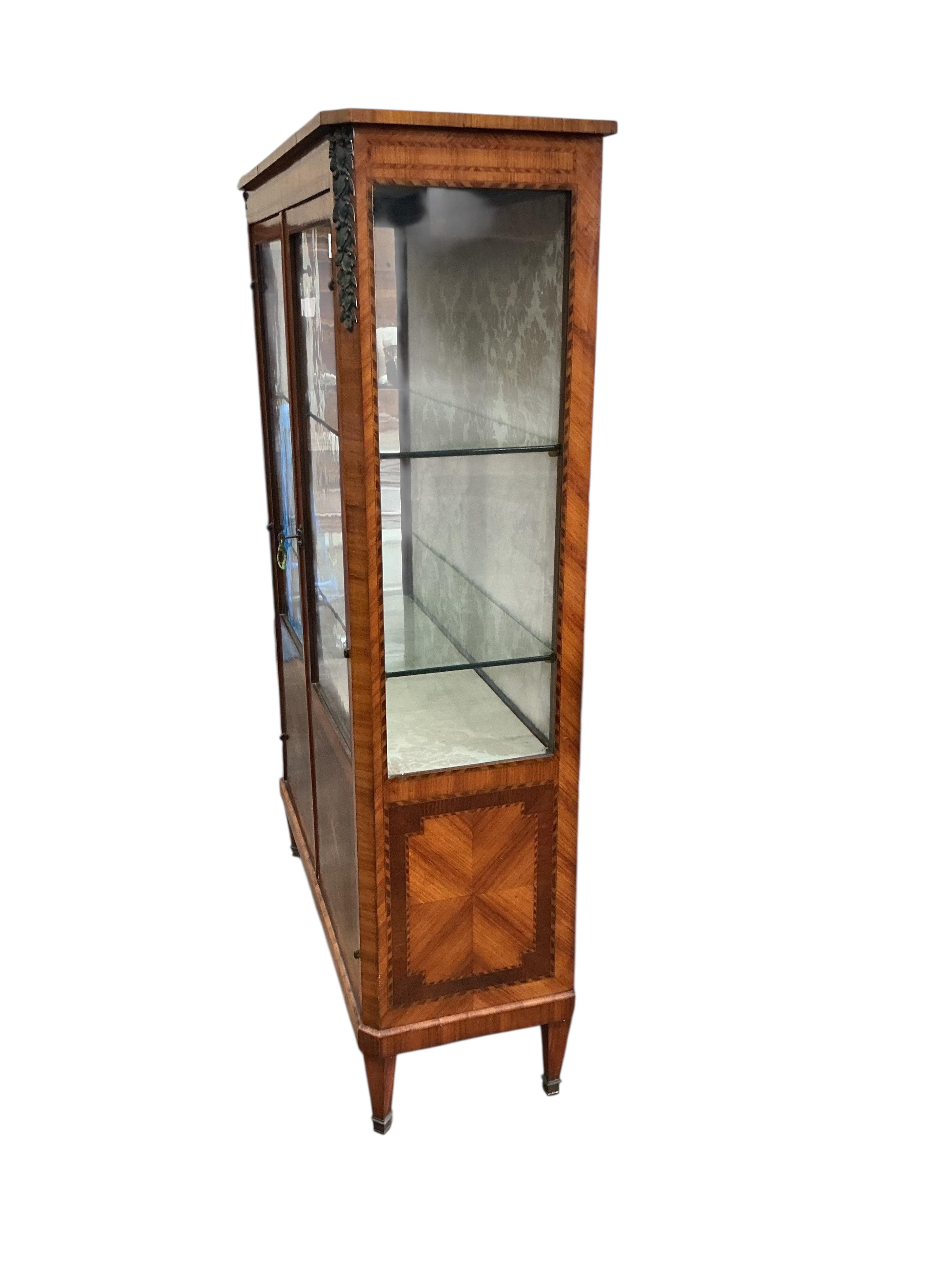 A 19th century French marquetry inlaid kingwood vitrine, width 108cm, depth 41cm, height 163cm